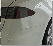 Photo of Tesla Model S with dent